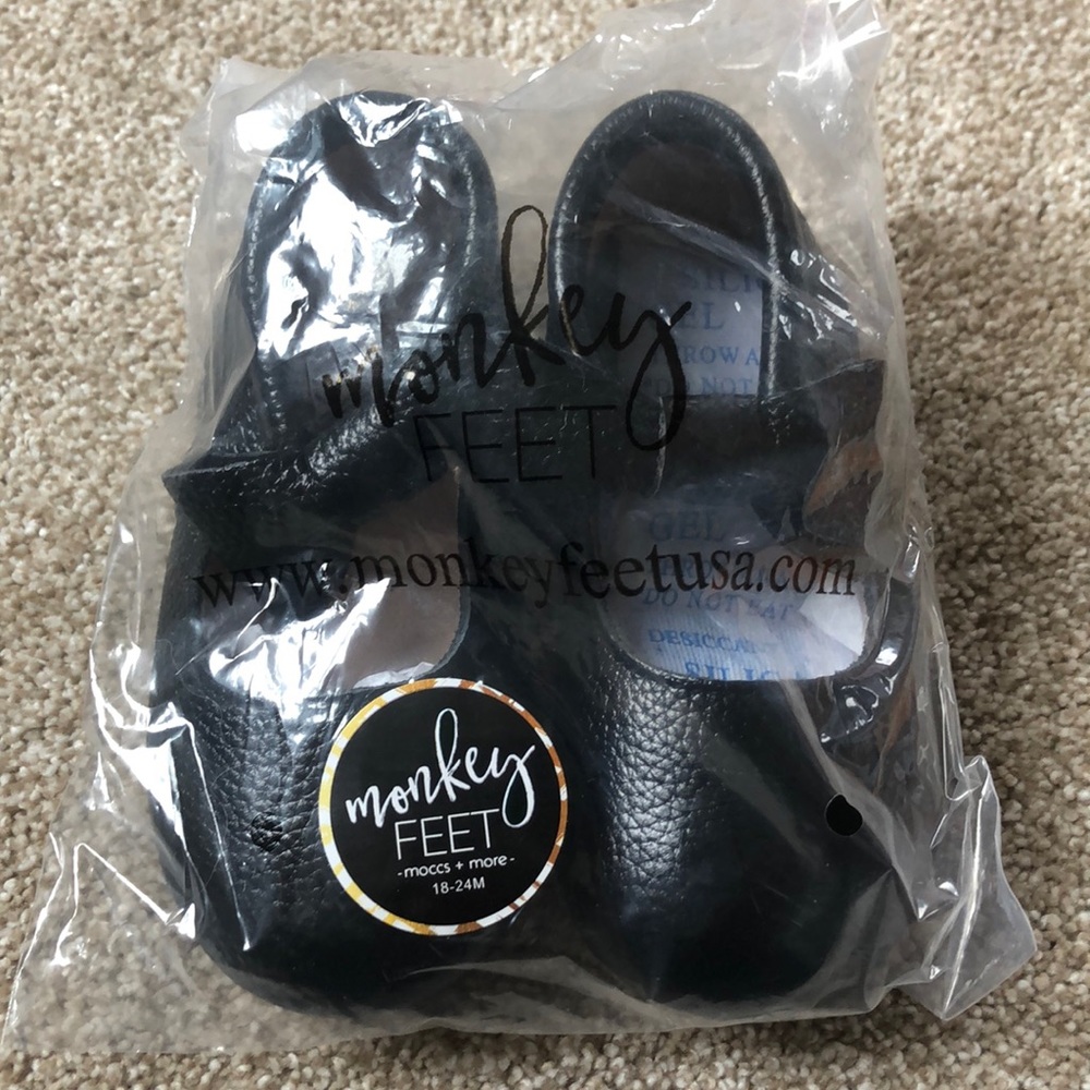 Brand new Black Bow Moccs